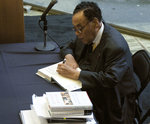 William T. Coleman signing books